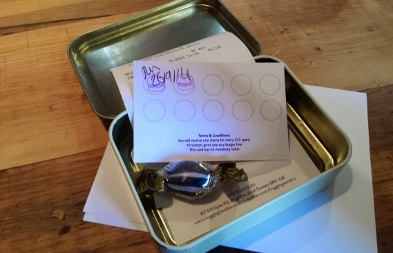 Our receipt and loyalty card in a old Gentlemans Choice tin